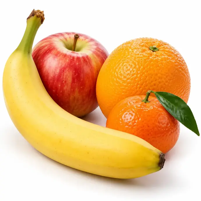 Bananes, pommes et oranges pour le petit-déjeuner au bureau